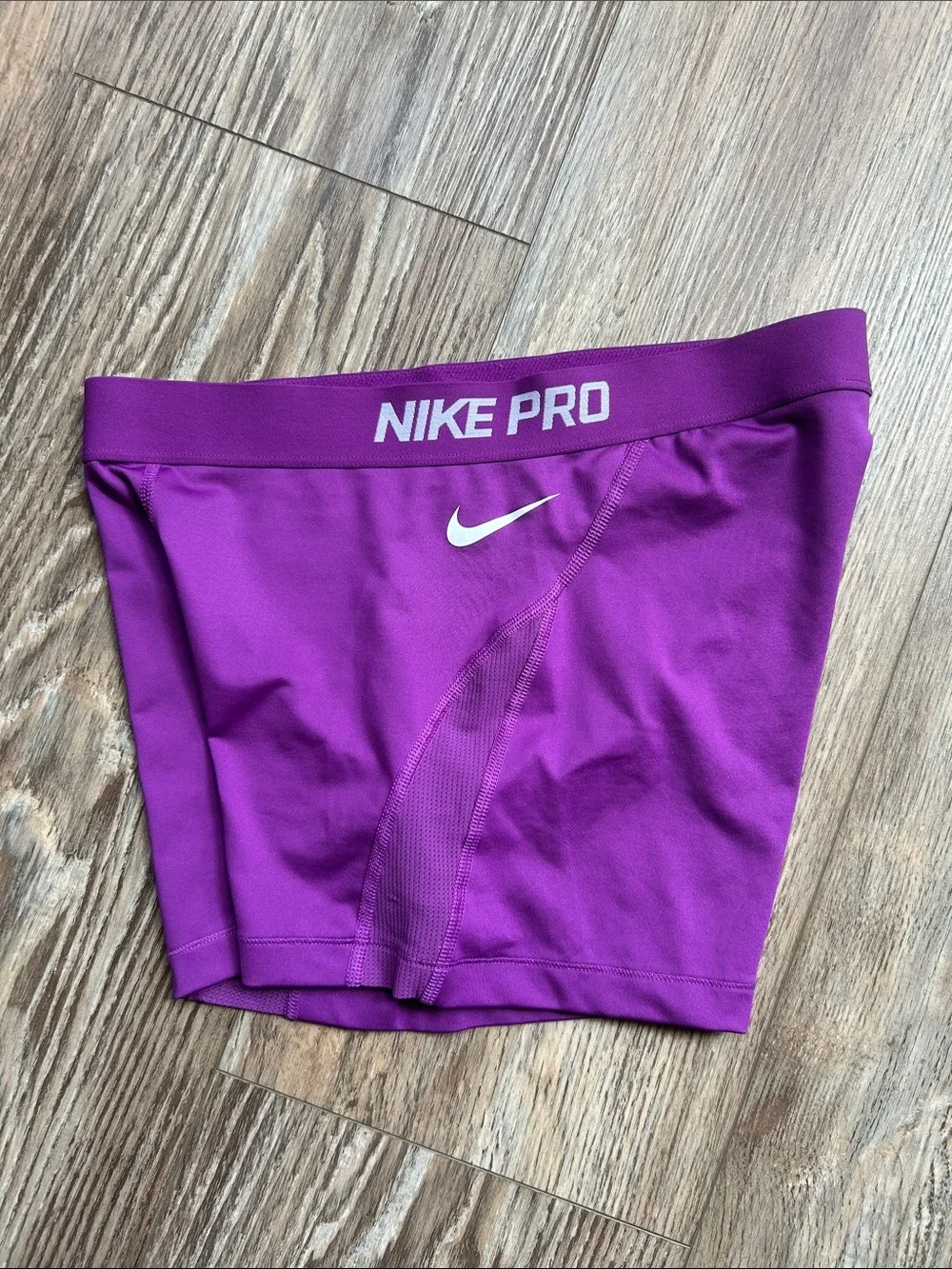 Nike Women's Purple Athletic Bike Shorts with White Swoosh